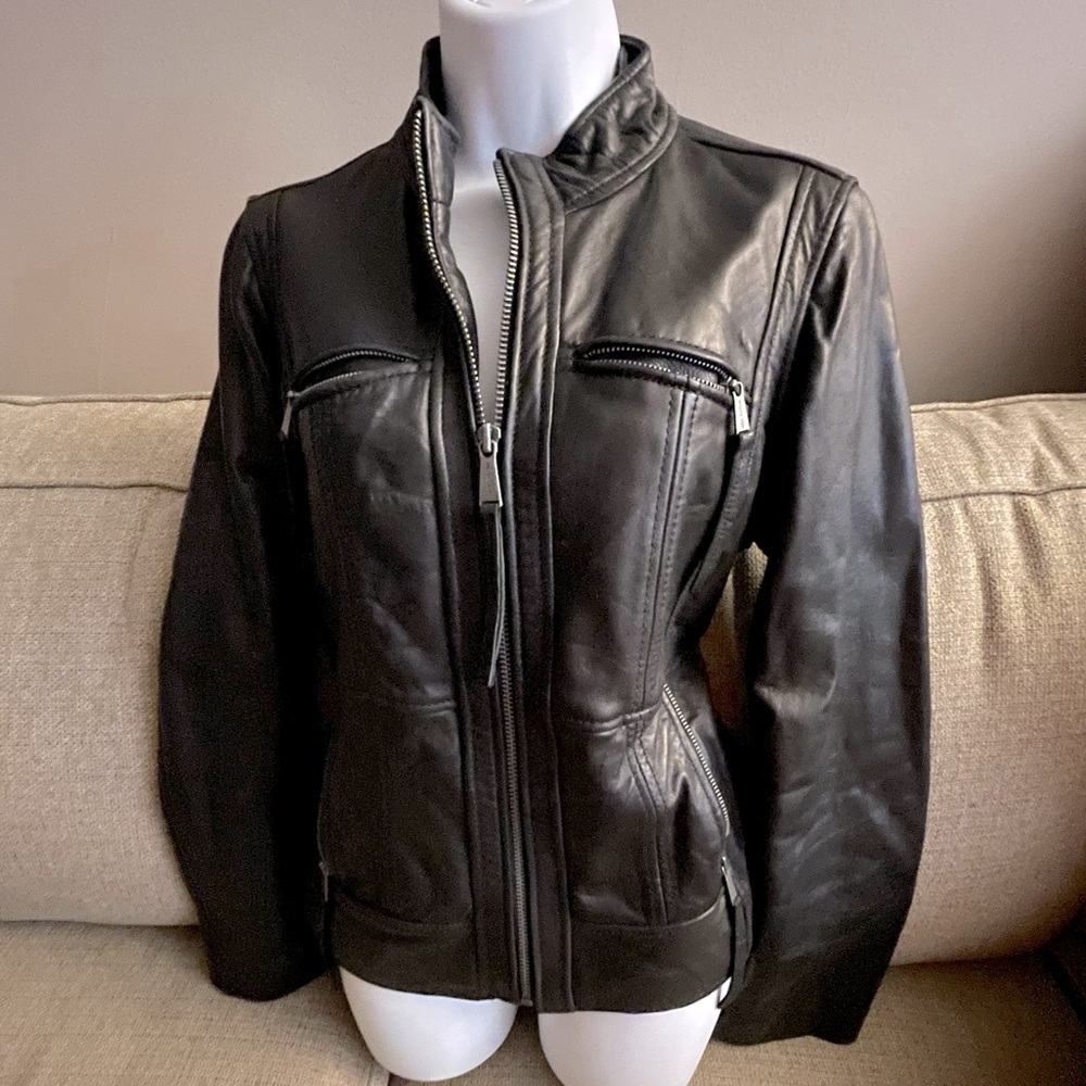 Michael Kors brown butter leather jacket; zippered closure for front/pockets.